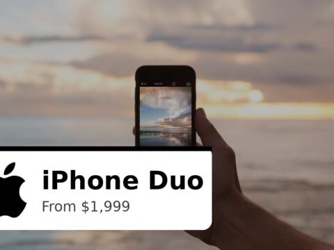 Apple iPhone Duo foldable phone held in hand at sunset