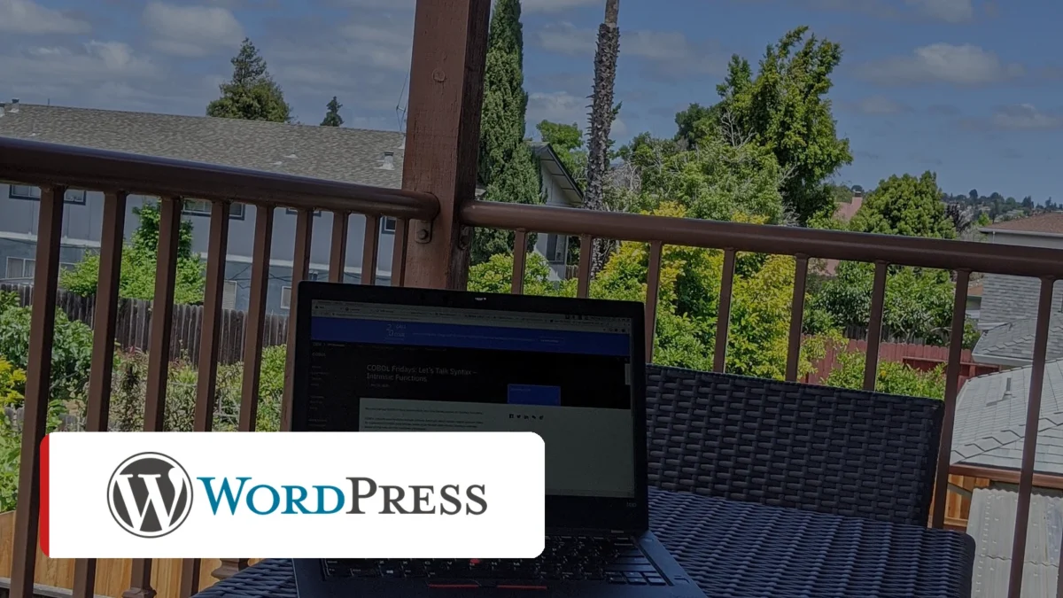 Photorealistic image of a laptop in shadow with the WordPress logo, warning of a backdoor attack